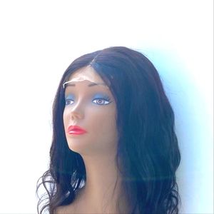 Human hair wig. Color 1b. length 14 inches. Loose curls